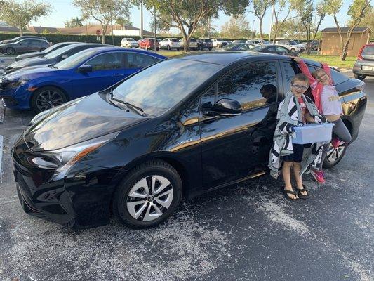 I am a single father, these are my kids Kaydence and Koda excited when I first got my Prius :)