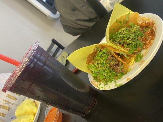 Hibiscus refresher, two hard shell birria tacos with cheese.