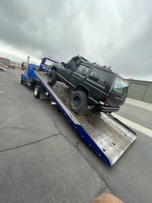 Customer jeep towed to their facility