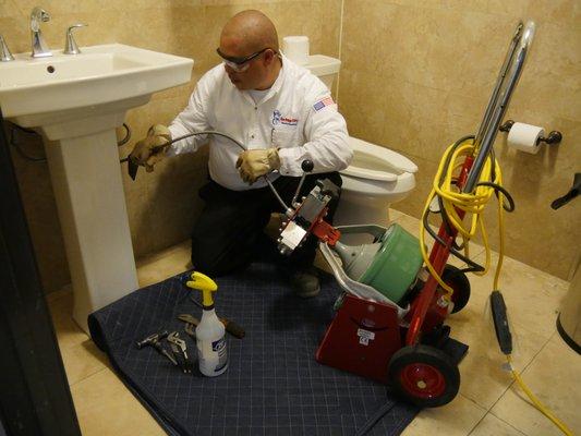 Unclogging a bathroom sink with no mess!