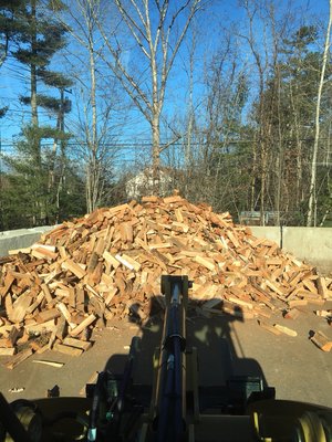 Kiln dried firewood waiting to be tumbled for delivery