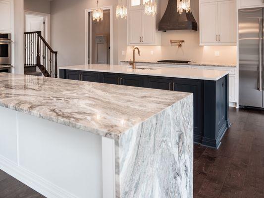 Kitchen remodeling with stone countertops, cabinets, tile, and more.