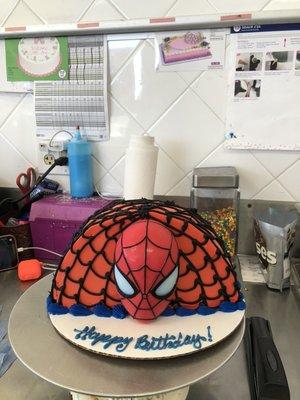 Fancy Spider-man ice cream cake including a deco toy for a customer cake order.