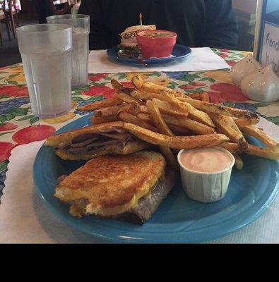 Delicious roast beef grilled cheese and the turkey sandwich and chowder in the background.