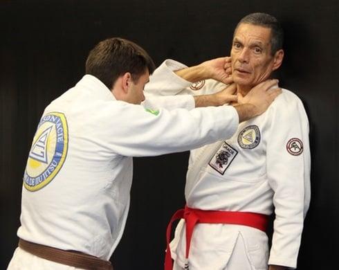 Head Instructor Greg Bartman training self-defense details with Grand Master Relson Gracie