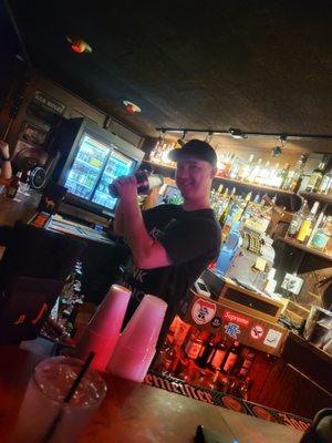 Best bartender! Very welcoming. Hole in the wall dive bar, right up my alley. Great patio area to sit and visit, and to make friends.