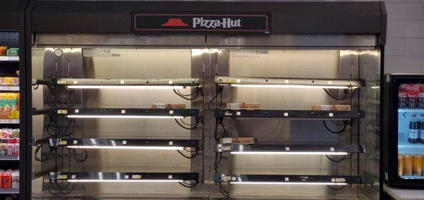 Hot shelf with pre-made pizza