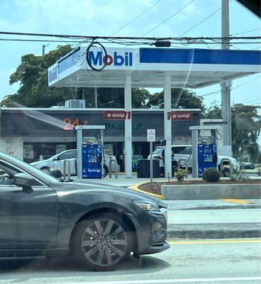 24/7 food market plus Mobil gas across from 7-eleven gas