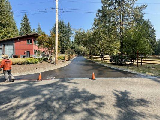 Freshly sealcoated asphalt road, protected pavement!