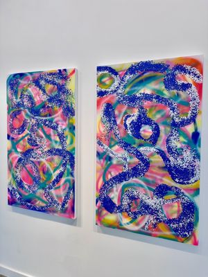 Ouroboros. Diptych, punched paper, spray paint, on canvas.