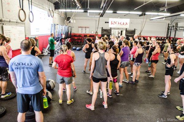 A morning class gets instruction for the daily WOD