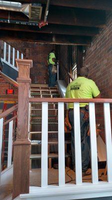 Craftsmen Installing Railing, Stairs Leading Up To South Dining Room.