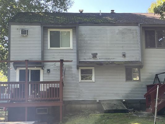 Old roof with lost of moss, bad shingles