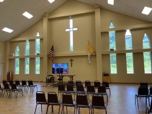 the fellowship hall (used for overflow seating with a tv streaming the service in the church)