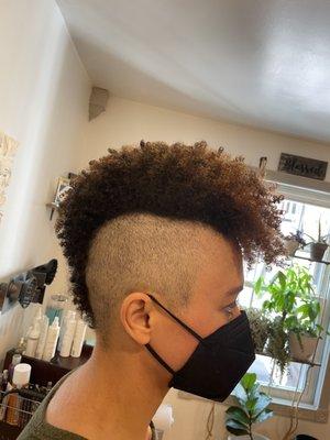 What could be better than a Mohawk? A Mohawk with highlights and hydrated curls