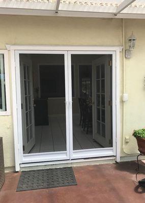 Brand new French set of swinging screen doors!