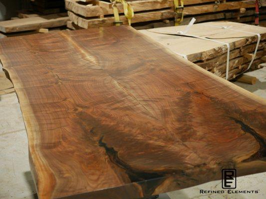 Amazing figure in bookmatched walnut table top.