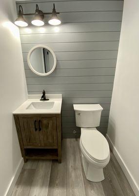 Completed 1/2 bath with shiplap.