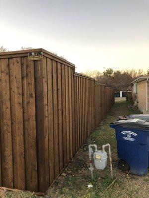 Fence with company name. Dallas