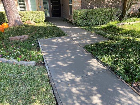 New concrete walkway with "picture-frame" finish.