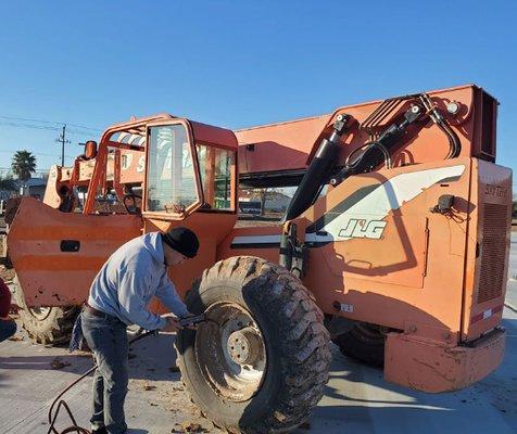 Flat tire? Stuck on the road? Call us! We can handle pretty much any tire on any machine, car, truck, or RV! Dead battery? We can help too!