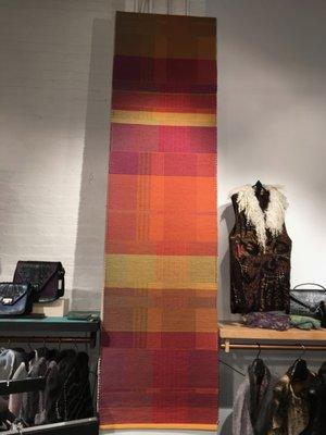 Handwoven rug by Claudia Mills, hand felted vest by B Felt.