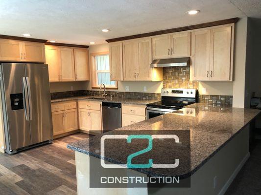 Kitchen expansion, via demolition of weight bearing walls and Remodel.