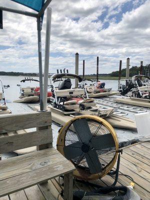 You check in where the skiffs are docked (you have to walk along the wooden pier first).