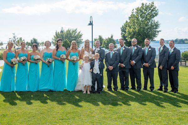 Bridesmaids dresses and groomsmen tuxedos