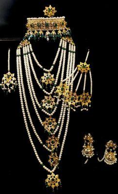 Beautiful Hydrabadi set. With 22k gold carat polish. Semi precious stones.