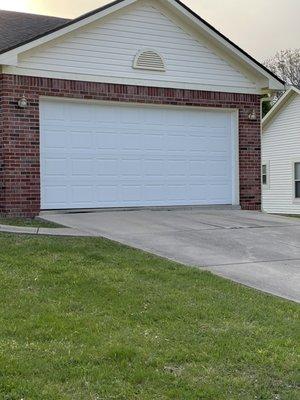 Homeowners were very happy with our fast reliable service. Now they can get in and out of the garage again.