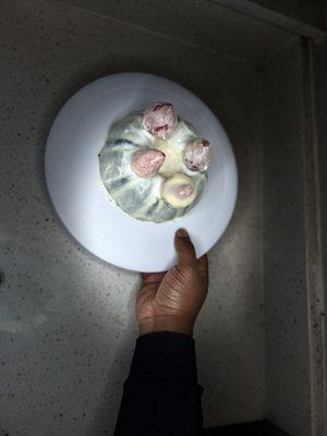 Upside Down Oreo Cheesecake's covered with white chocolate and strawberry