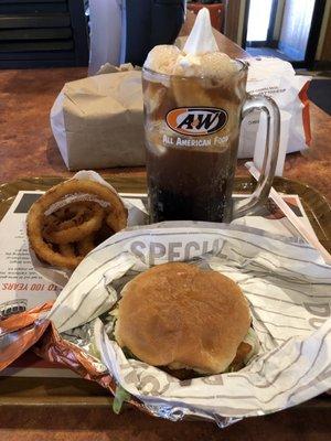 Fish sandwich, onion rings and a classic root beer float.