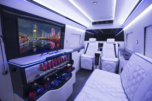 We do custom projects too! We redesigned this limo with all the onboard technology you would need!