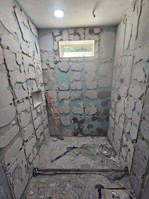 How tiles were attached. No tiles broen in removal