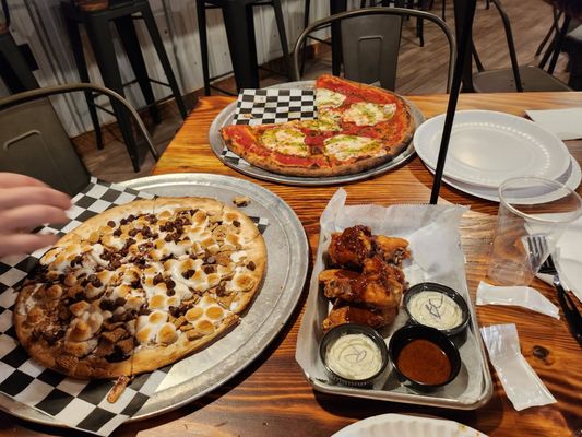 Smores pizza, margaritta pizza, and wings