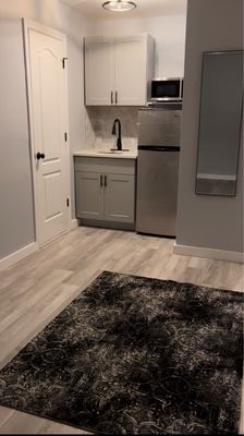 Luxury vinyl plank and area rug