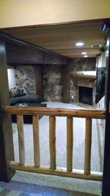 Decorative posts and beams, new rock wall and railing