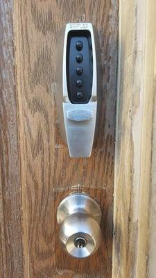 Nolita, Manhattan, NY 10012 Simplex pushbutton entry lockset installed on wood door. The best solution for keyless entry.