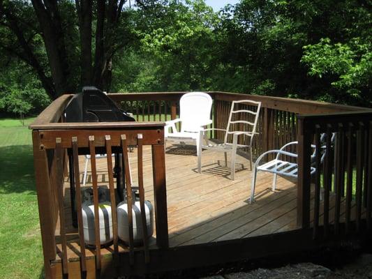 Lounge deck with gas BBQ grill.