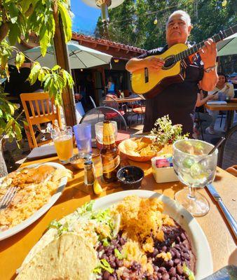 Serenaded by strolling guitarist