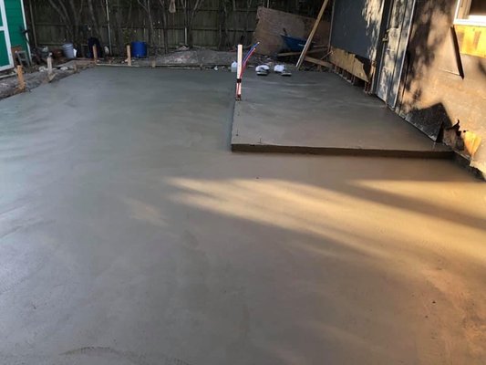 Finished concrete slab addition