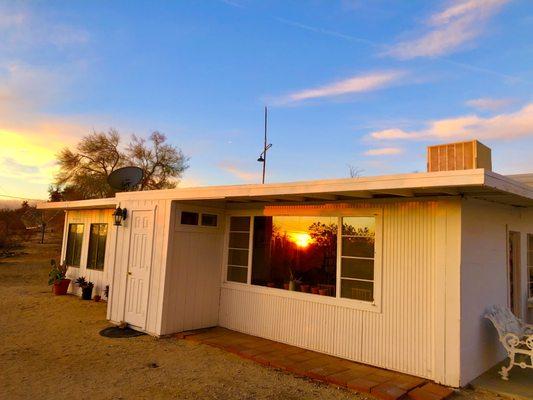 This is the main house where you can stay in private bedrooms and share a kitchen and community rooms.