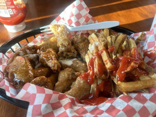 Garlic, Parmesan, and hot honey wings with fries