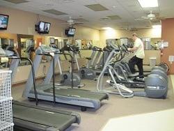 Full Cardio Room with 6 treadmills, 2 upright bikes, 3 elliptical machines and 3 T.V.'s for your cardio theater experience.