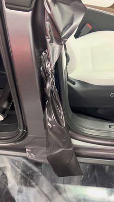 Tesla Model Y door jam being installed