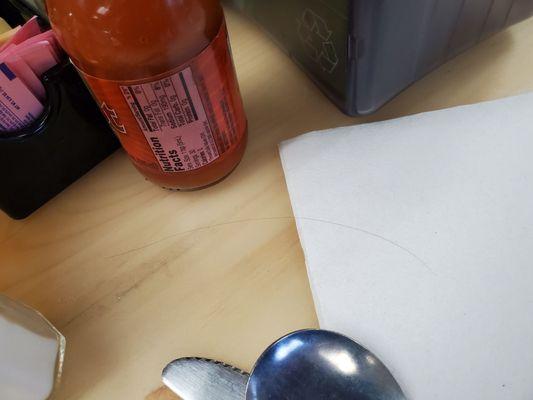 Hair on the counter! Not good. Your servers MUST WEAR HAIR NETS! Long hair travels.