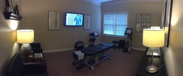 This is our Chiropractic treatment room. Relax in a stress-free atmosphere while listening to jazz and receiving your painless adjustment.