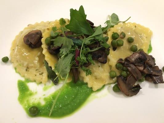 Mushroom ravioli with pea sauce