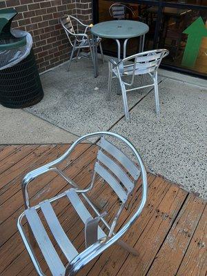 Broken outside chairs.